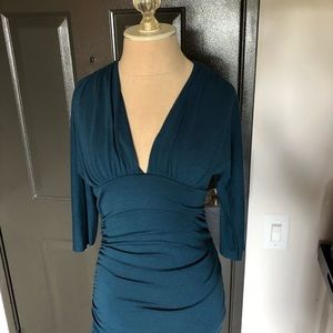 Teal cotton top with deep V in front and back